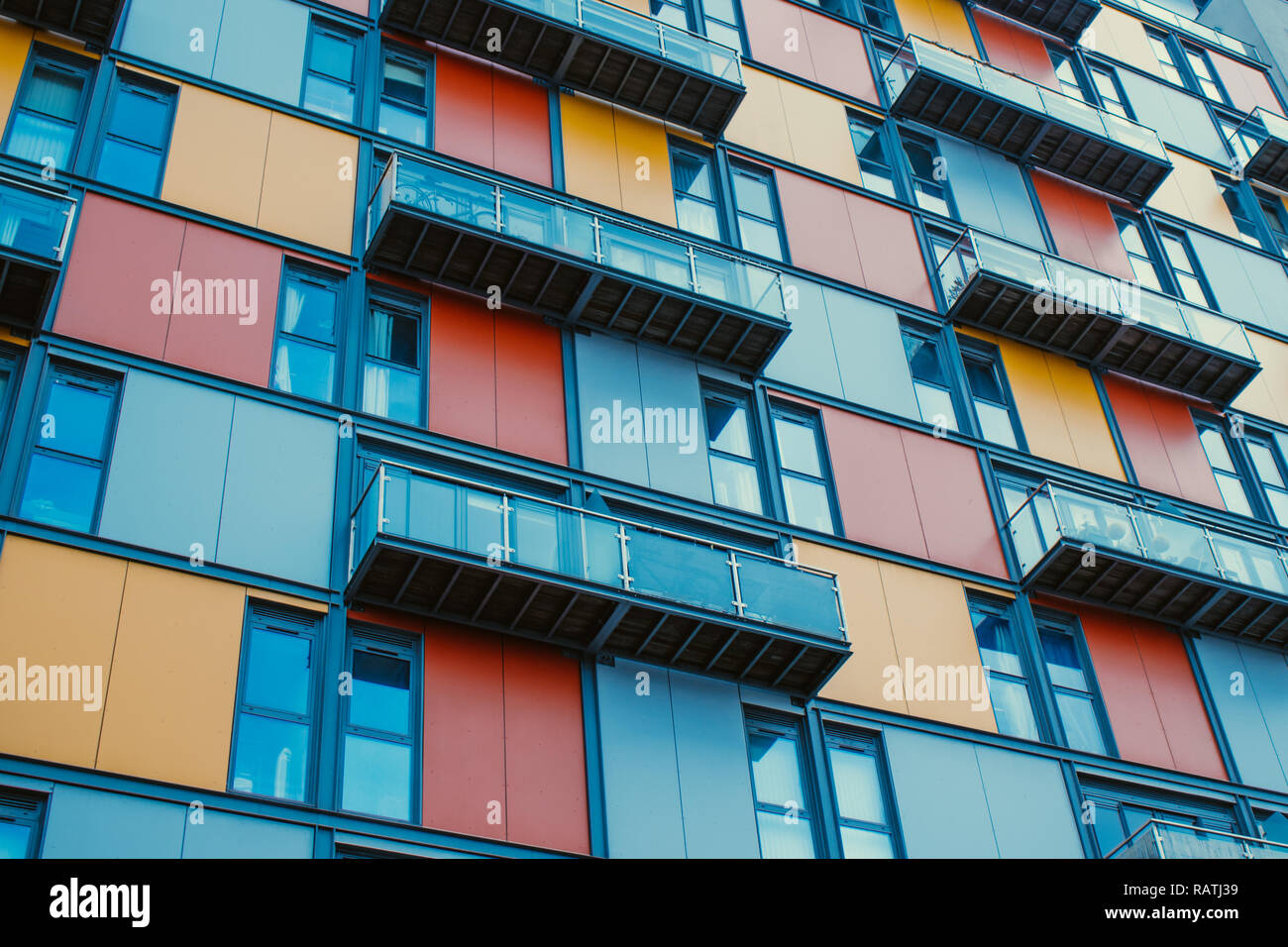 Brightly Coloured Flats with Balconies 