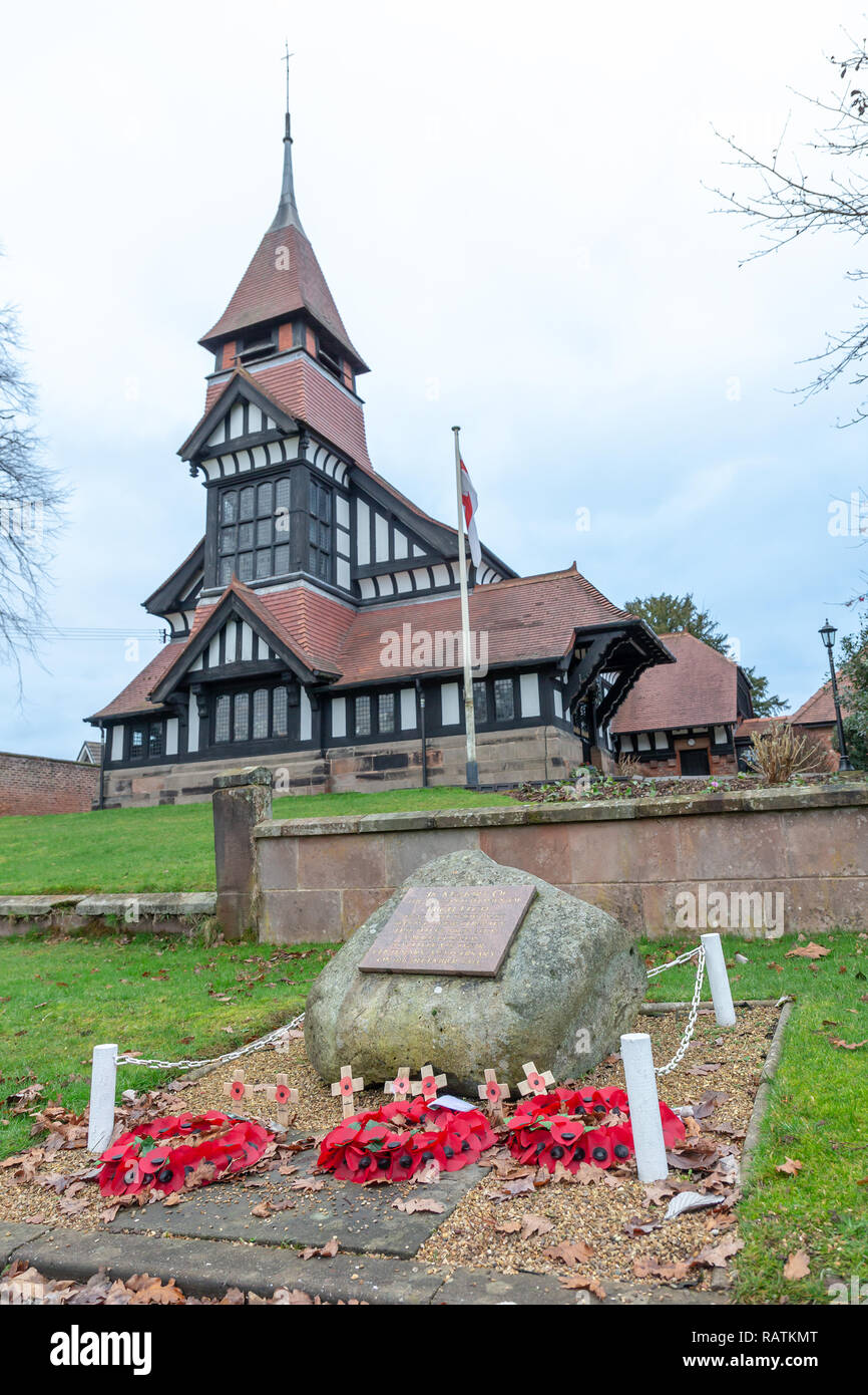 December 2018 - The West end of St John’s Church viewed from The Avenue, showing the remembrance plaque, High Legh, Knutsford, Cheshire, England, UK Stock Photo