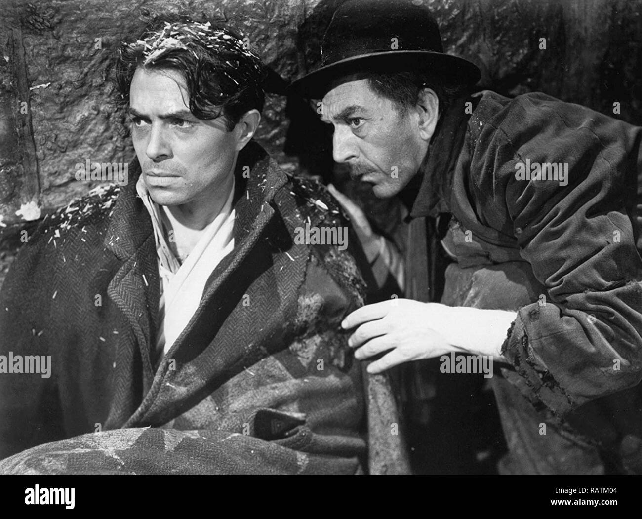 THE ODD MAN OUT 1947 Two Cities Films production with  James Mason at left and F.J. McCormick Stock Photo