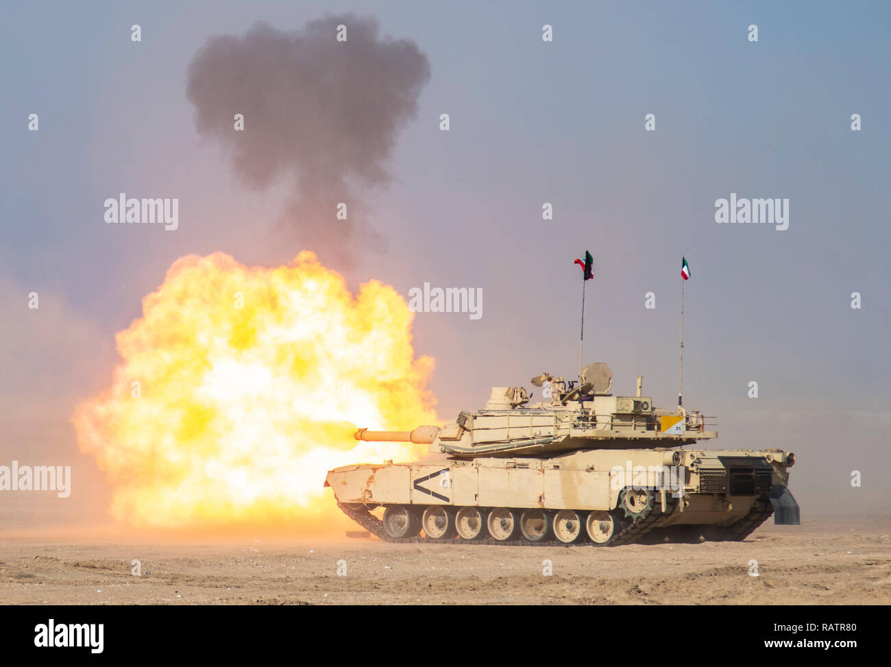 Soldiers of the Kuwaiti Land Force engage targets at Udairi Range during a joint live-fire exercise with the Mississippi National Guard’s 155th Armored Brigade Combat Team on December 12, 2018. Desert Observer, a biannual event conducted as part of Task Force Spartan, is an exercise that integrates a three-stage planning process, a dry run-through and a joint live-fire exercise geared toward increasing interoperability and cohesiveness between the United States Military and Kuwaiti Land Forces. Stock Photo