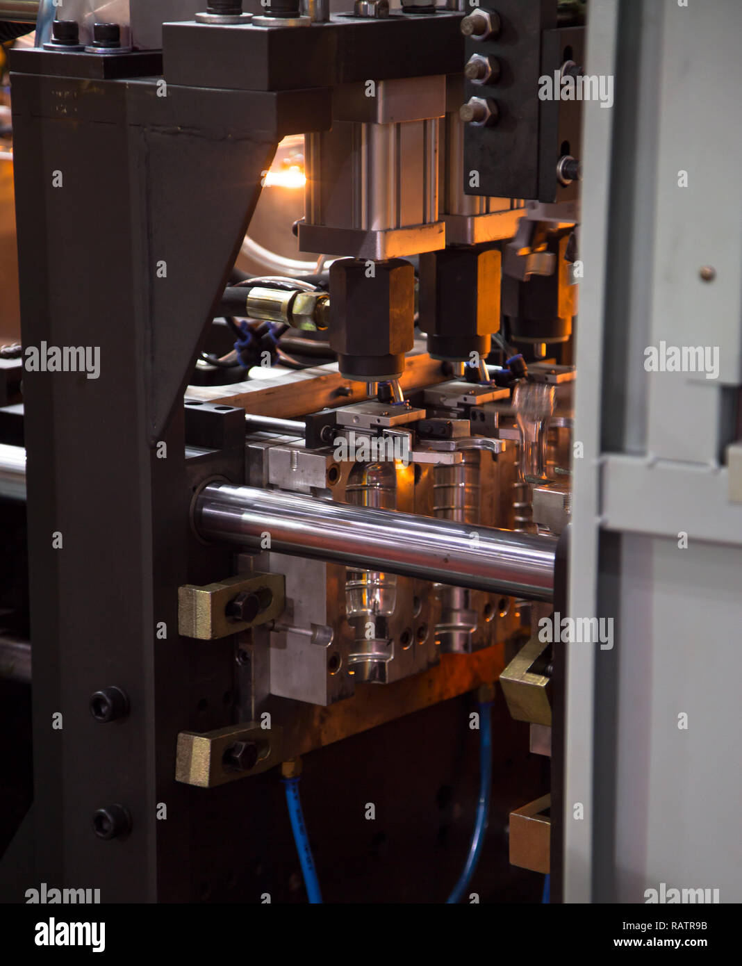 Heating process for plastic bottle blowing machine Stock Photo Alamy