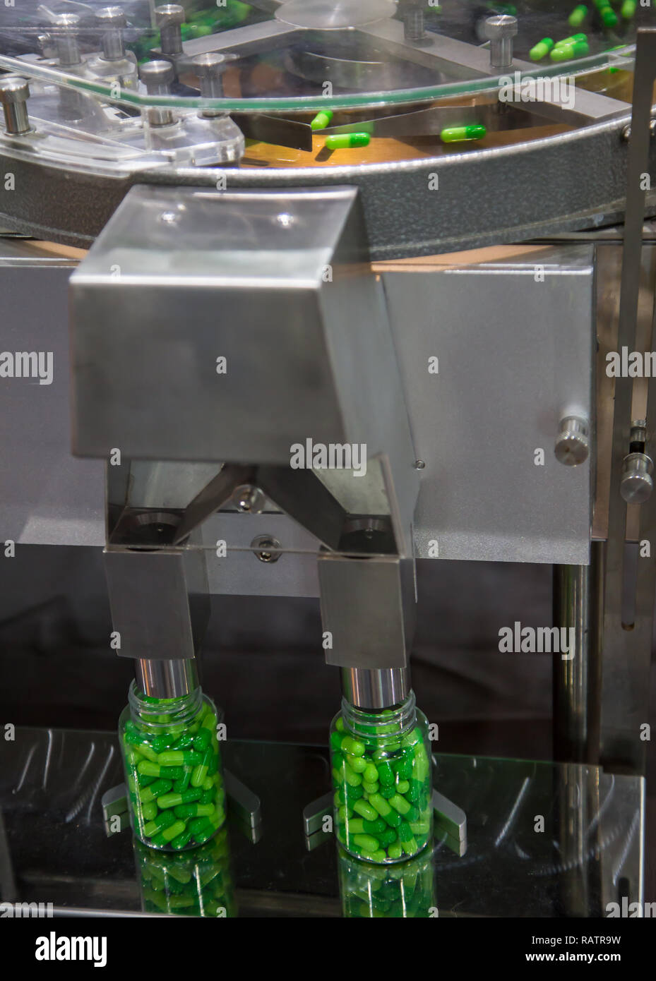capsule pharmaceutical pills counting and filling machine Stock Photo Alamy