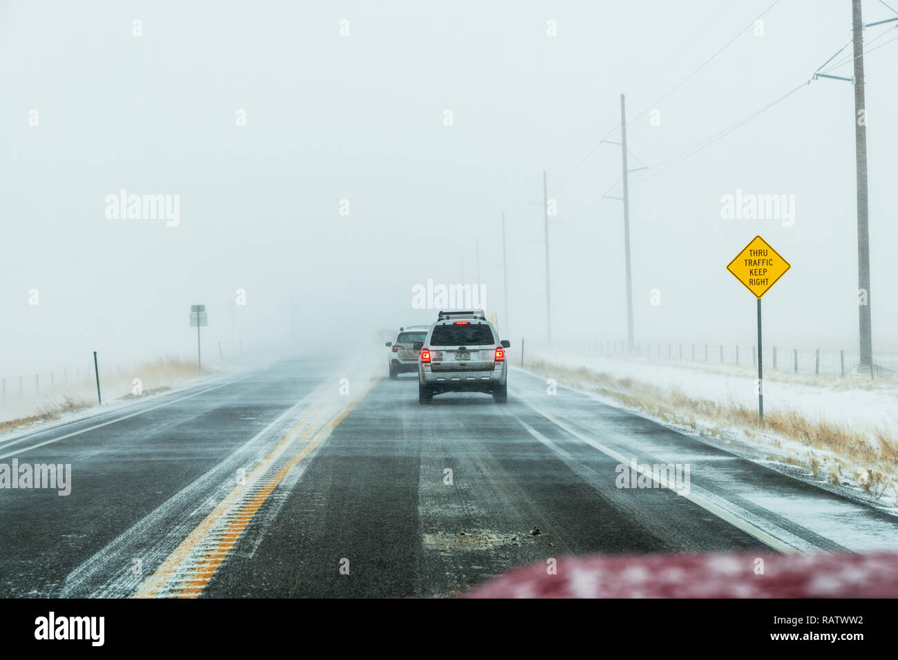 Traffic slowed due to winter storm; Rt. 285; near Jefferson; central Colorado; USA Stock Photo