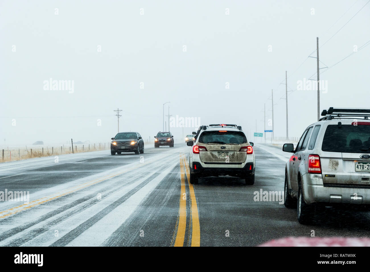 Traffic slowed due to winter storm; Rt. 285; near Jefferson; central Colorado; USA Stock Photo