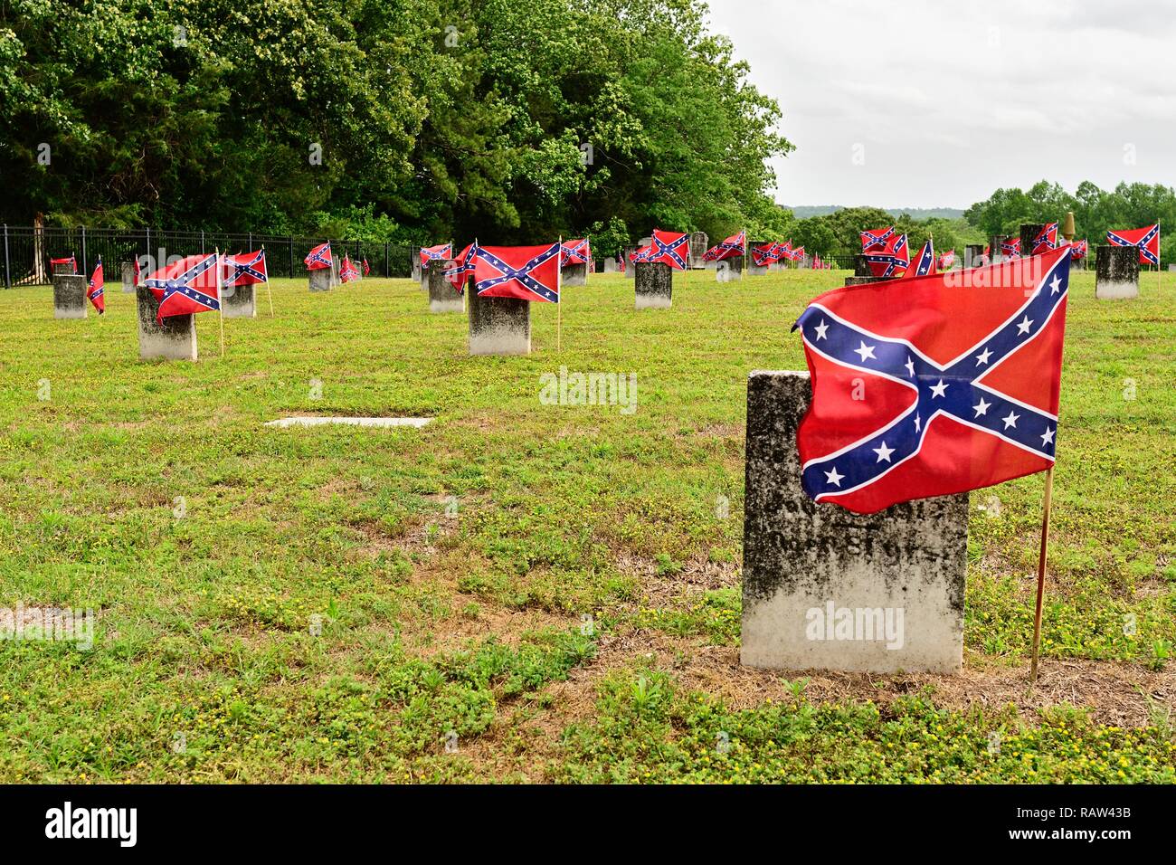 American Civil War Confederate army cemetery with small confederate flags by the headstones in Marbury Alabama, USA. Stock Photo