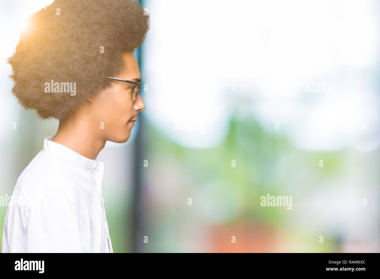 Young African American Man With Afro Hair Wearing Sunglasses