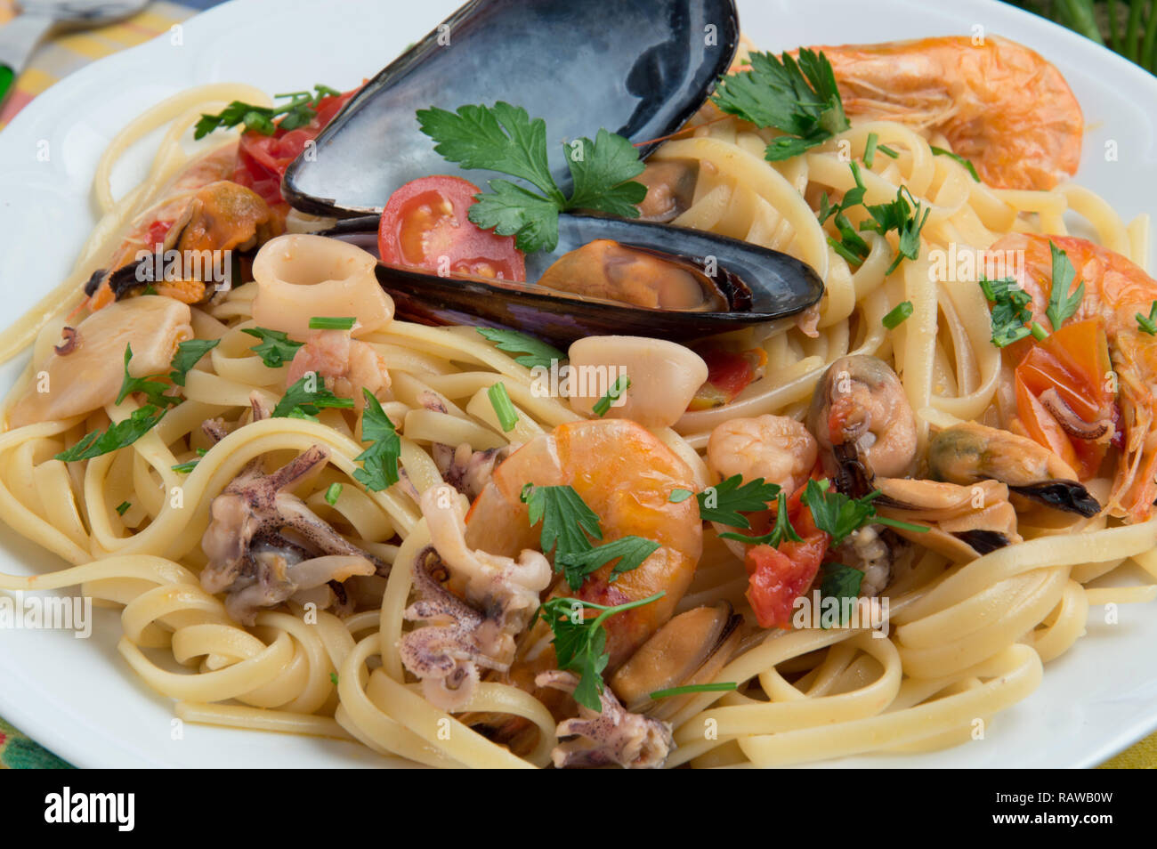 Typical Italian Pasta Recipe Spaghetti Allo Scoglio Spaghetti Pasta With Seaffod In Tomato Sauce Stock Photo Alamy