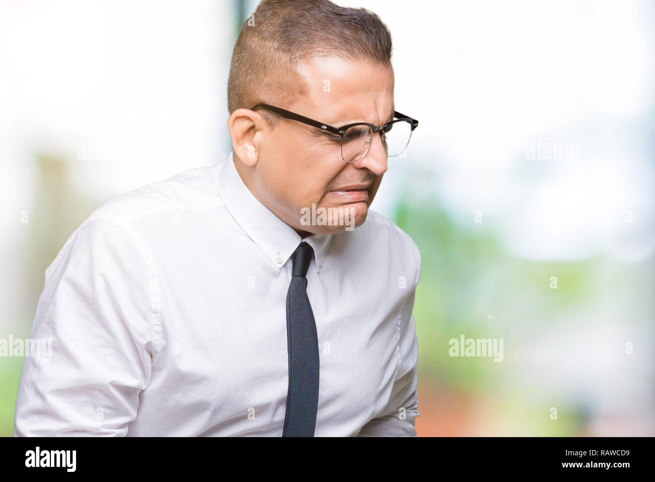 Middle age bussines arab man wearing glasses over isolated background ...