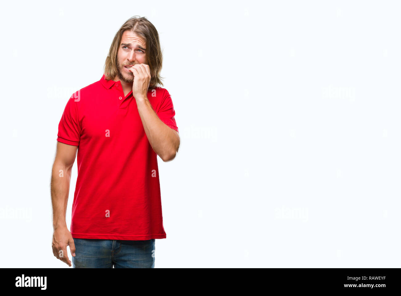 Young handsome man with long hair over isolated background looking stressed and nervous with hands on mouth biting nails. Anxiety problem. Stock Photo