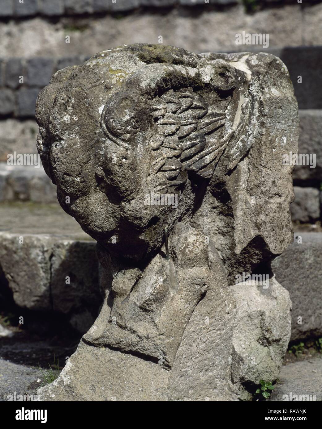 Italy. Pompeii. Ancient Roman city destroyed by the eruption of the  Vesuvius in 79 AD. Small Theatre or Odeon, built in 80 BC. Remains of a  balustrade with a winged gryphon (lion's