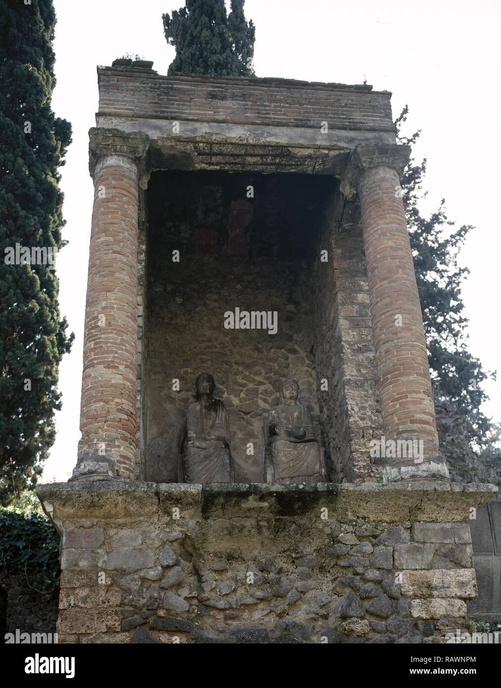 Italy. Pompeii. Necropolis of Nocera Gate. Located on the sides of a road that runs parallel with the city walls. There are several burial monuments. 1st century BC-1st century AD. Tomb 90S of a Magistrate and his wife. Late Republican era. 50-30 AD. Campania. Stock Photo