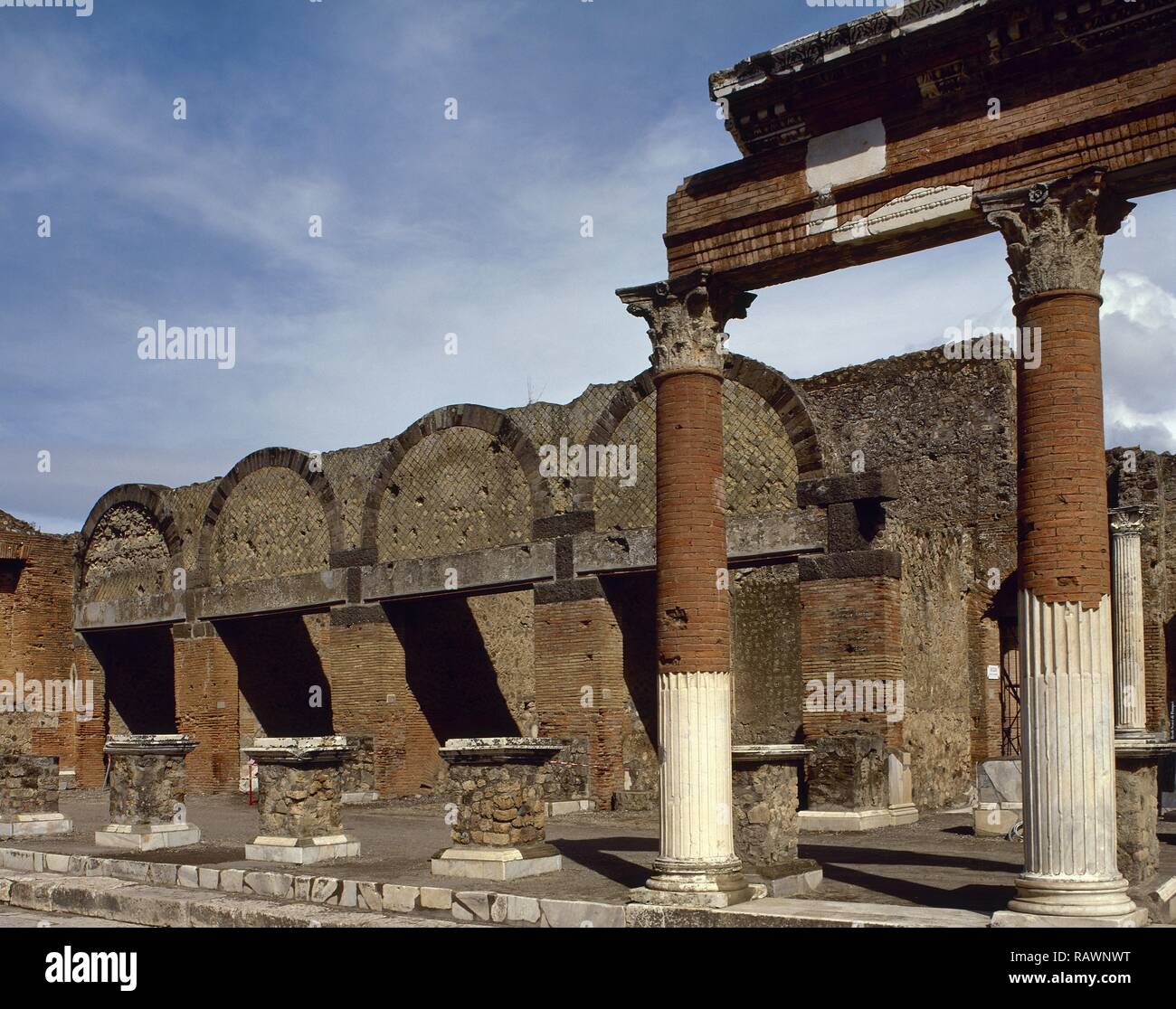 Italy. Pompeii. The Macellum , the public food market, in the north-east corner of the Forum. This complex was built in the imperial age. There was a large number of shops. View of one of the three entrances. Campania. Stock Photo