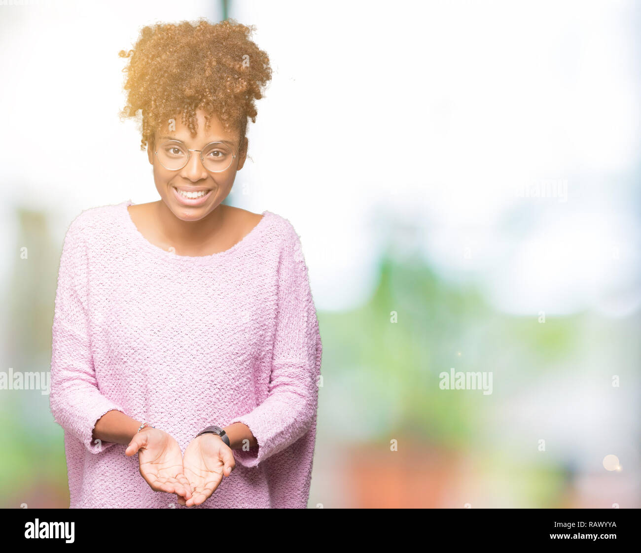 Open hands african american giving hi-res stock photography and images ...