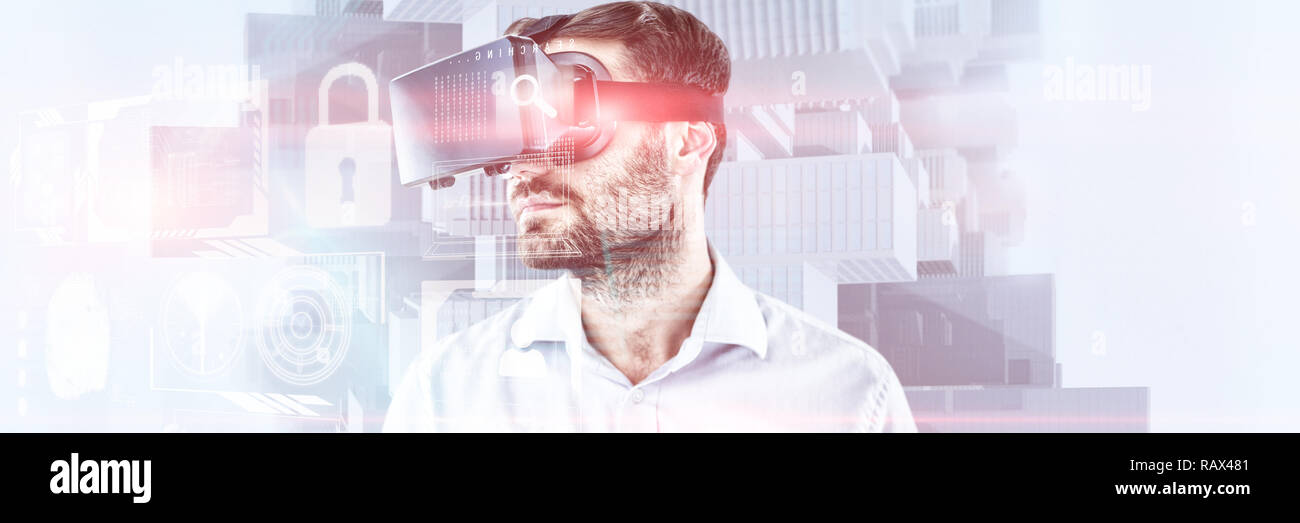 Composite image of man with beards using oculus rift headset Stock Photo