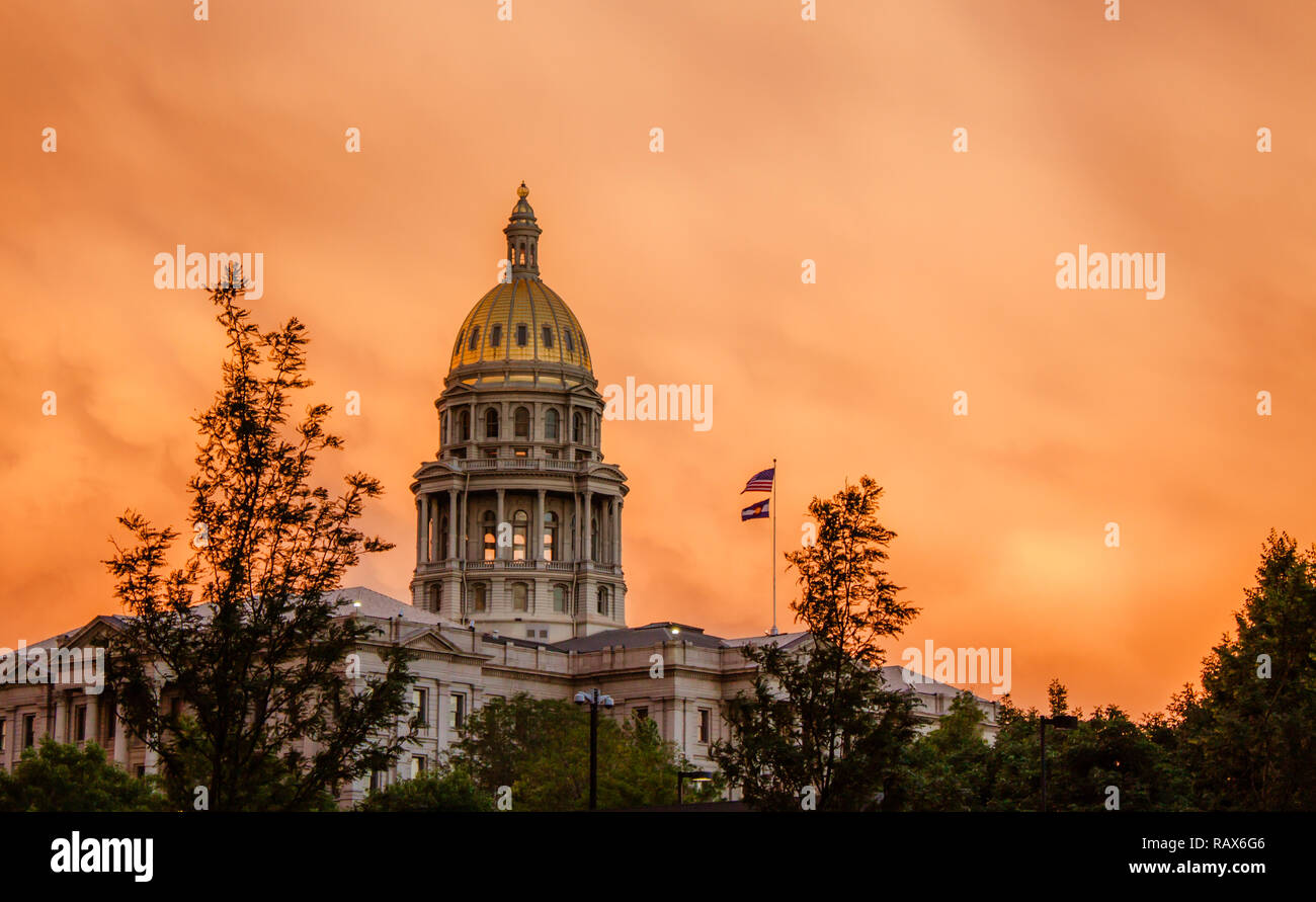 Glowing Orange sunset over Denver, Colorado State capital building Stock Photo