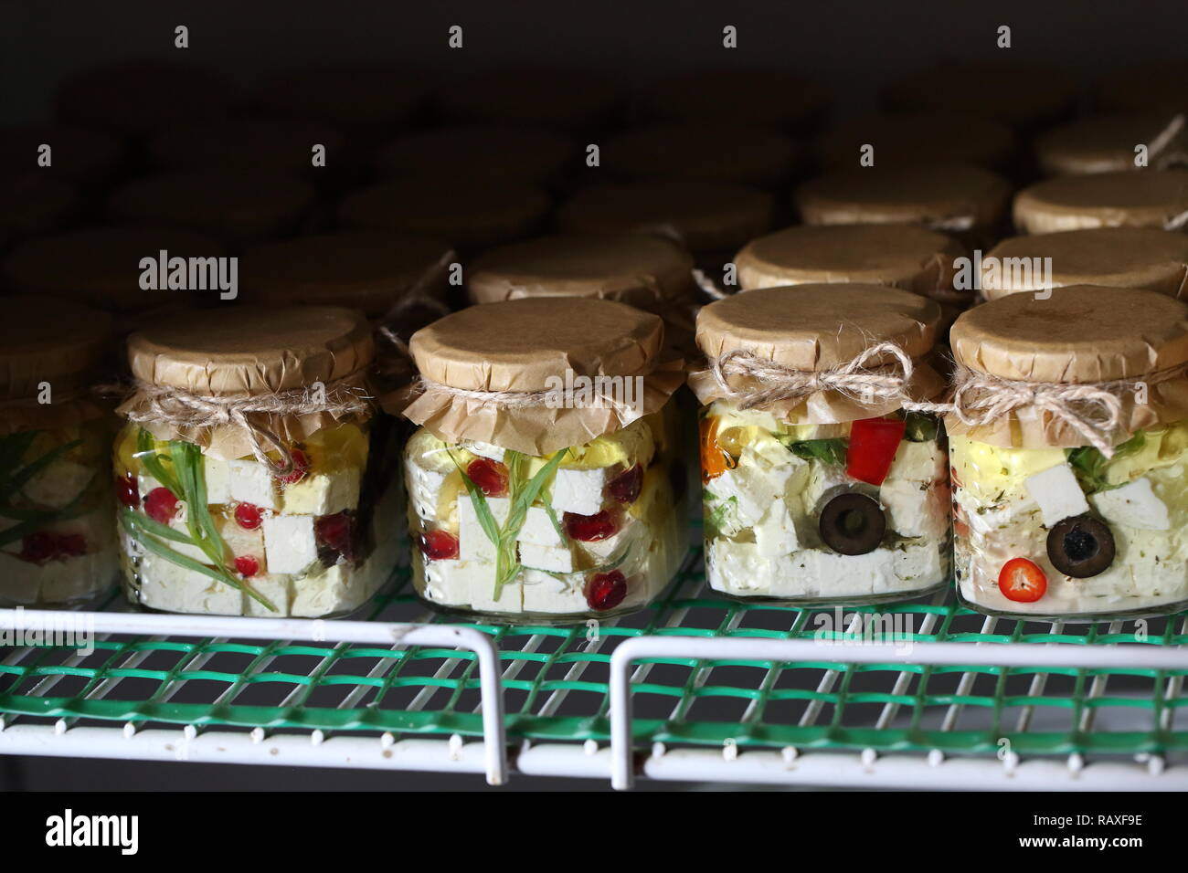 Marinated Feta Jars Stock Photo Alamy