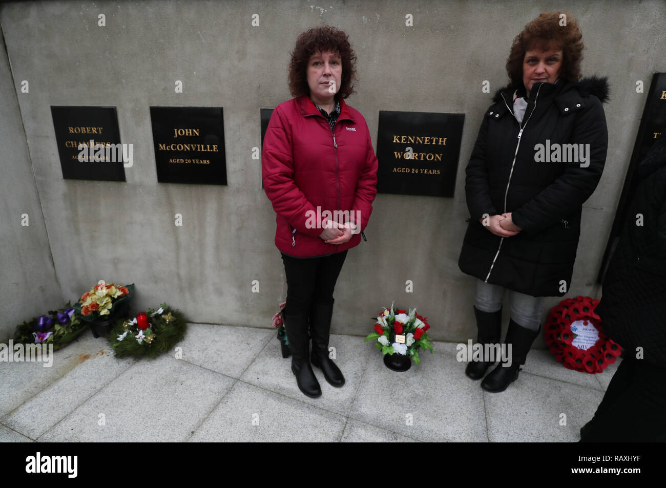 Racquel Brush (left) and her sister Suzanne Hinds, daughters of Kingsmill victim Kenneth Worton, attend a roadside service on Kingsmill road marking the 43rd anniversary of the shooting dead of 10 Protestant workmen by republicans at Kingsmill in South Armagh. Stock Photo