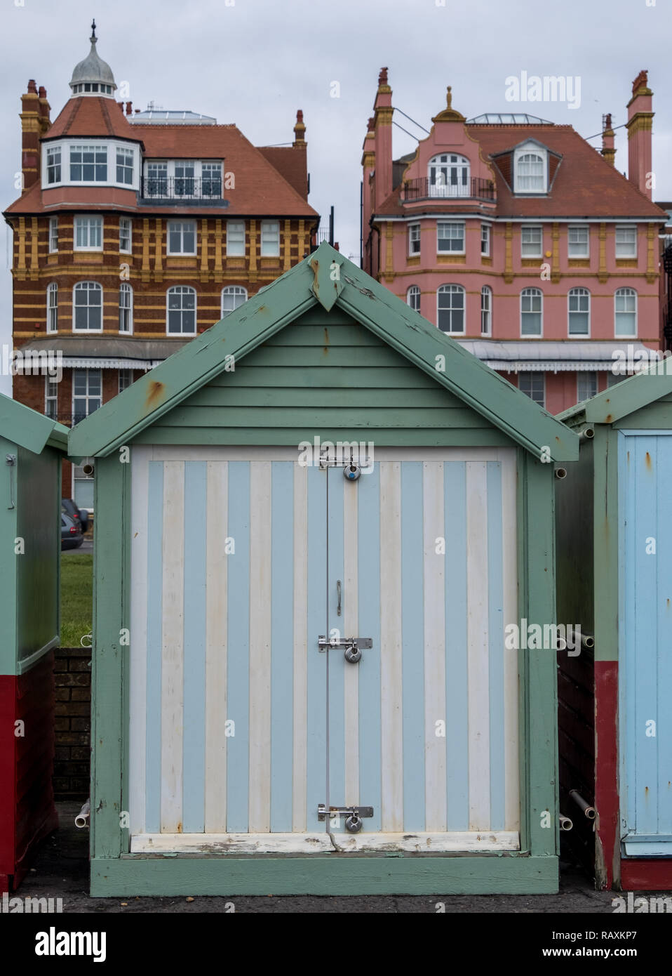 Colourful beach huts on the promenade at Hove Gardens, East Sussex