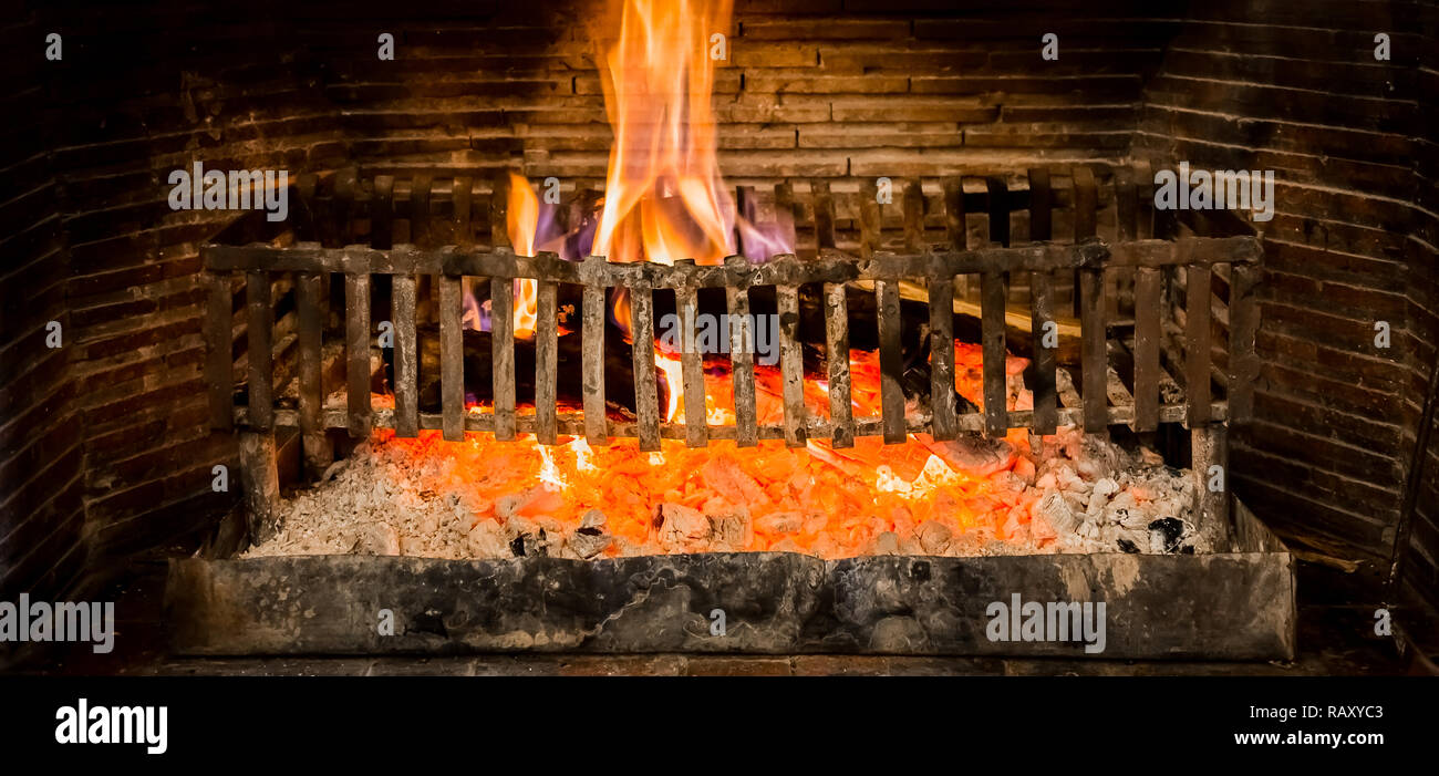 Burning Logs In A Winter Fireplace Stock Photo 230473603 Alamy