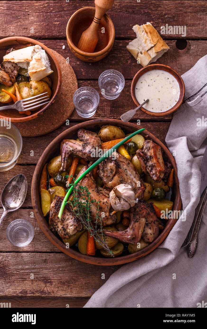 Cooked Rabbit Top View Oven baked rabbit with potato and carrots, top view Stock Photo - Alamy