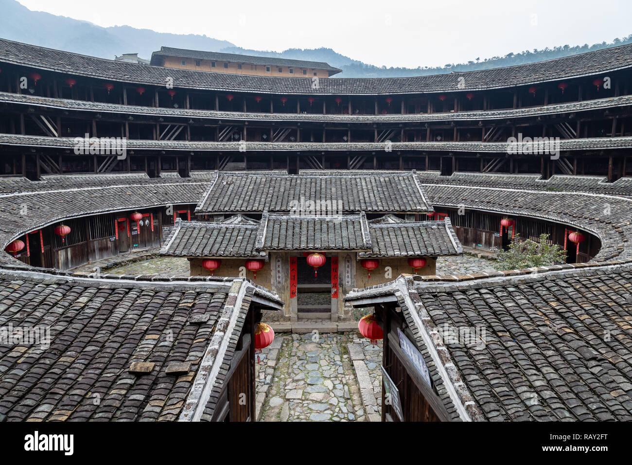 Jiqing Lou in ChuXi Cluster, Fujian Province, China. The tulou are ancient earth dwellings of the Hakka people, still inhabited by local communities Stock Photo