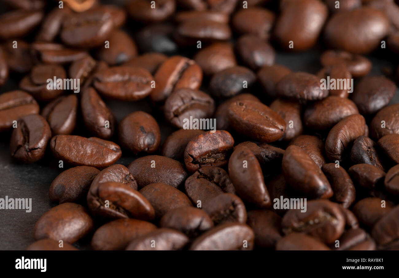 Brown coffee beans roasted close-up Stock Photo - Alamy