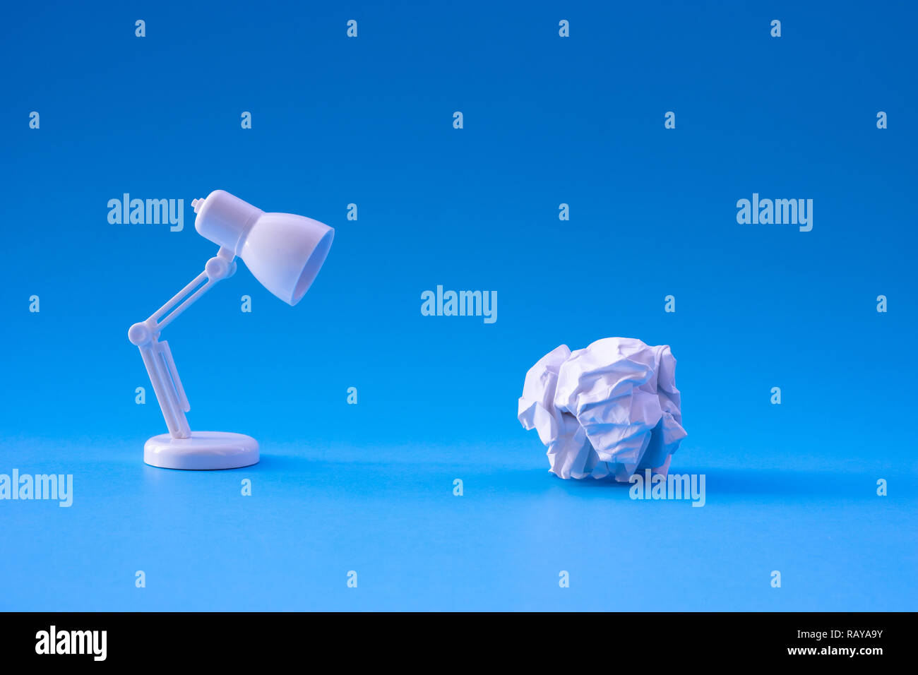 Ideas and creativity concepts with paper crumpled ball and lamp.Business solution. Stock Photo