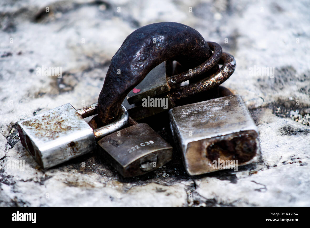 Rusty padlocks abandoned on the pier lisbon Stock Photo