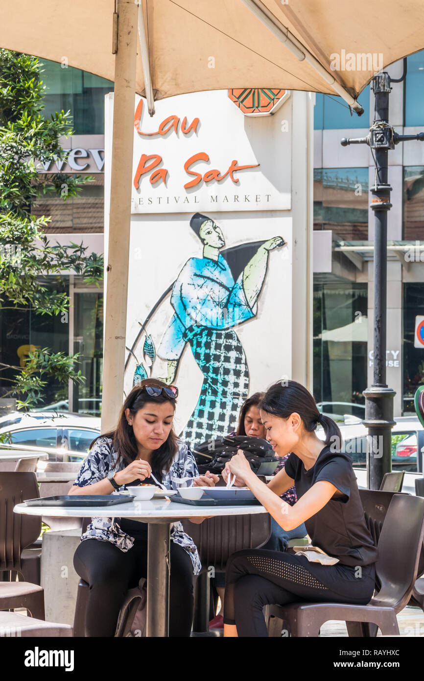 Singapore - 19th December 2018: Lau Pa Sat food court in the  Central Business District. It is a popular lunchtime venue with office workers. Stock Photo