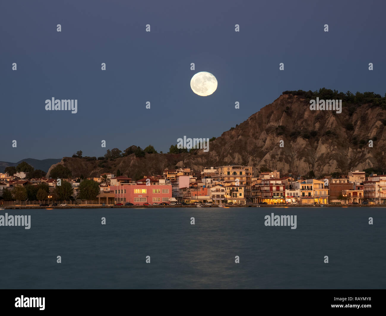 Full moon over in Zante town harbor, Zakinthos Greece Stock Photo