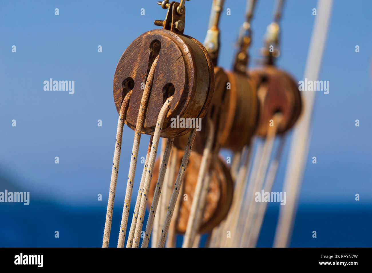Old ship tackles. Old sailing ship vessel. Background Stock Photo