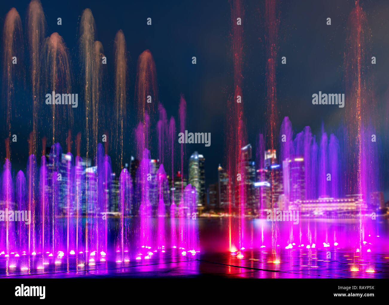 SIngapore water show with city skyline in background Stock Photo Alamy