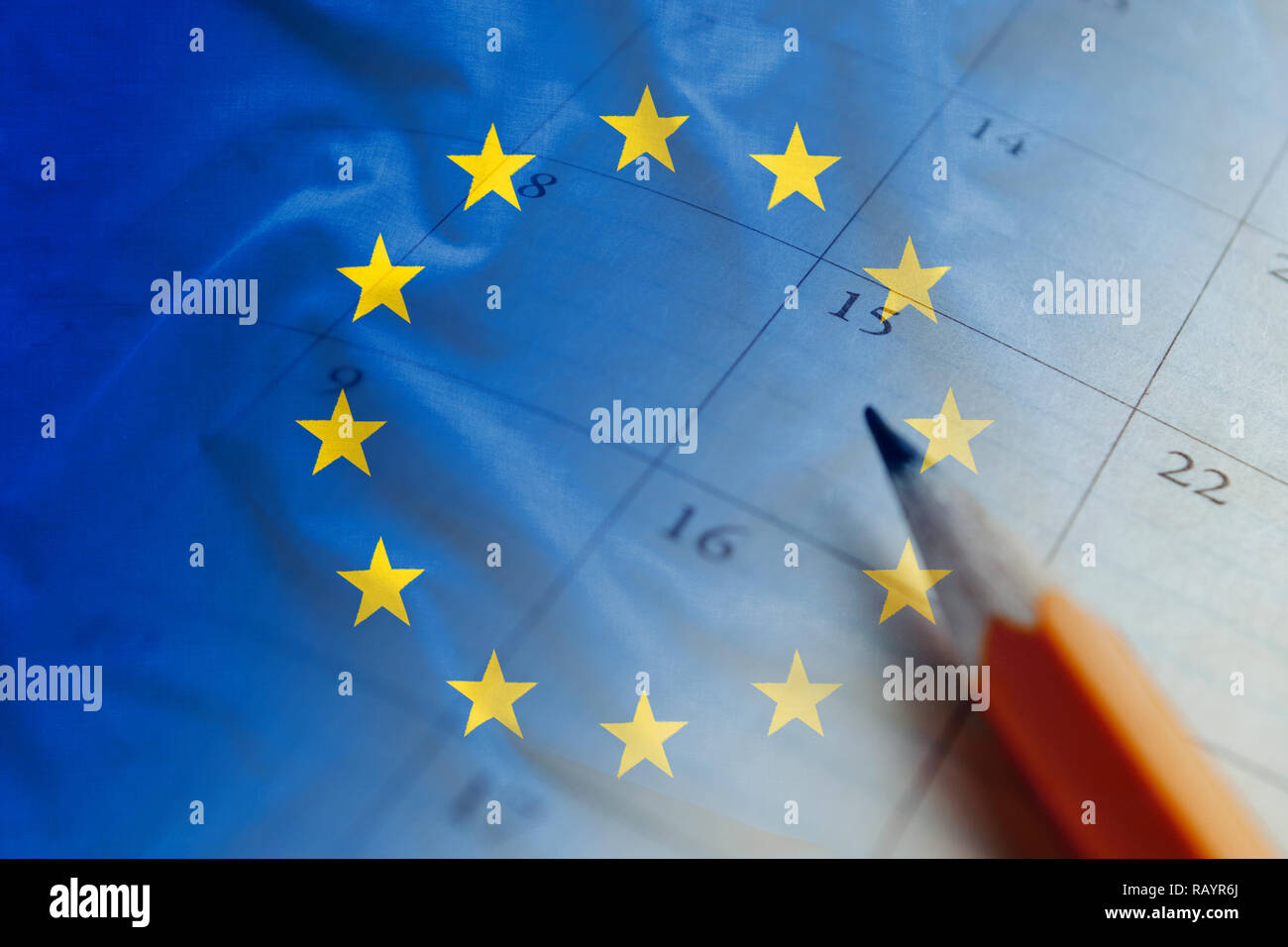 European Union flag and calendar with pencil for making reminders on