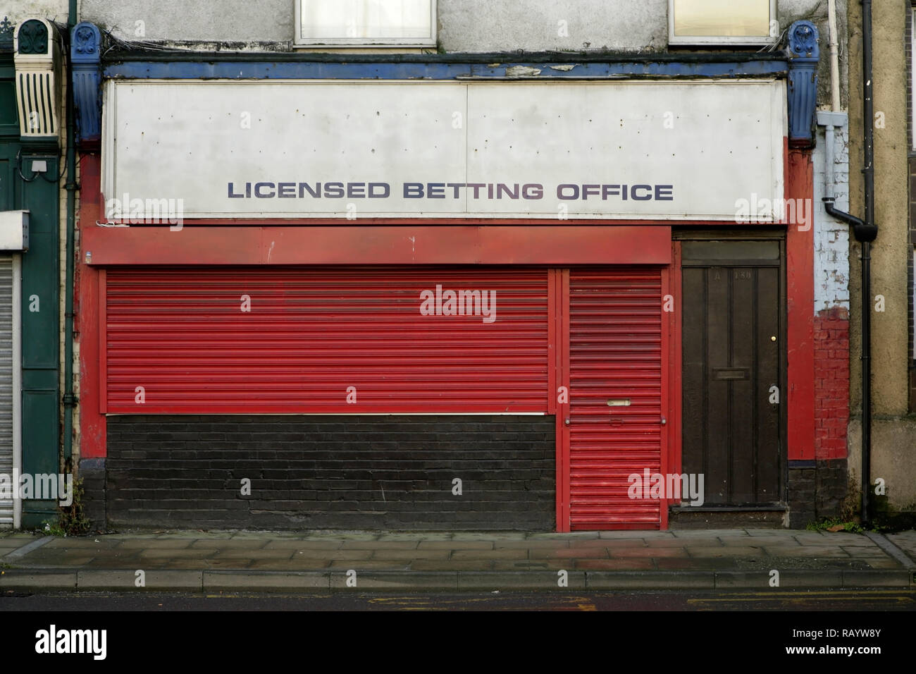 Closed and abandoned betting office, Cleethorpe Road, Grimsby, UK Stock