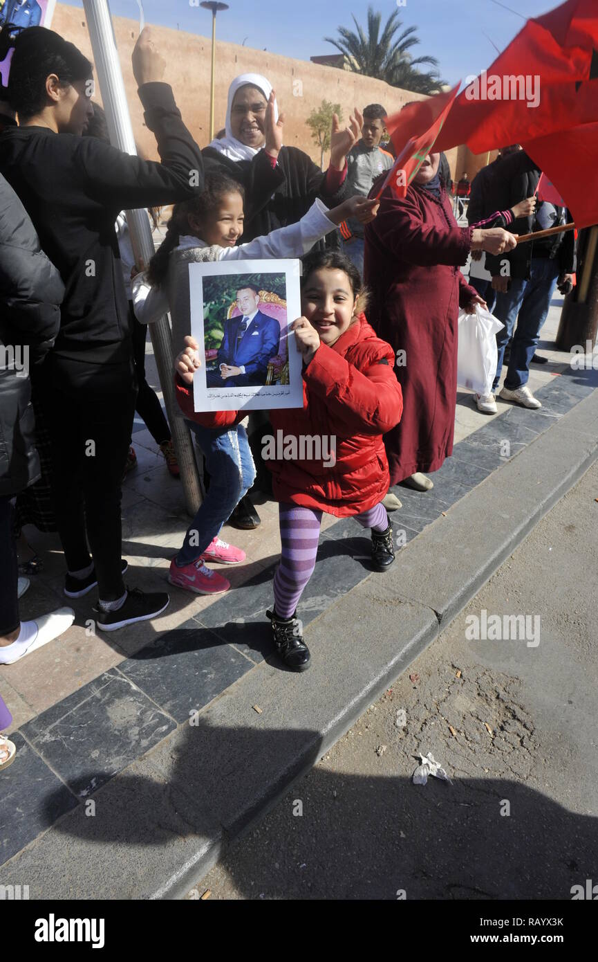 Rabat March of millions of Moroccans hold Moroccan flags Date 13-Mar-2016 Stock Photo