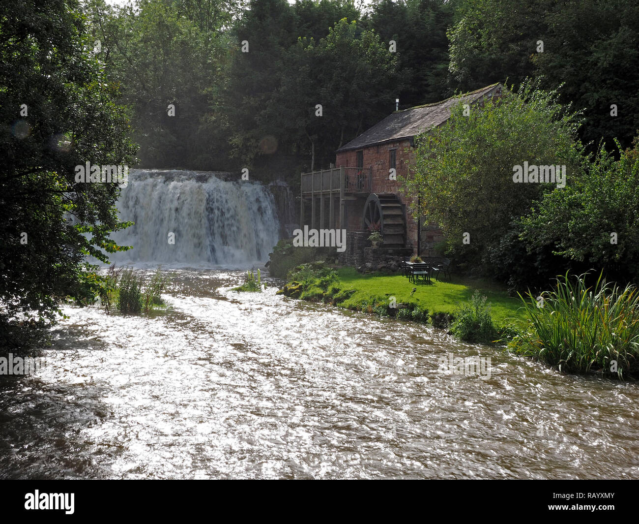 The MIll at Rutter Falls on Hoff Beck in the Eden Valley in Cumbria, England, UK in flood after heavy rain Stock Photo