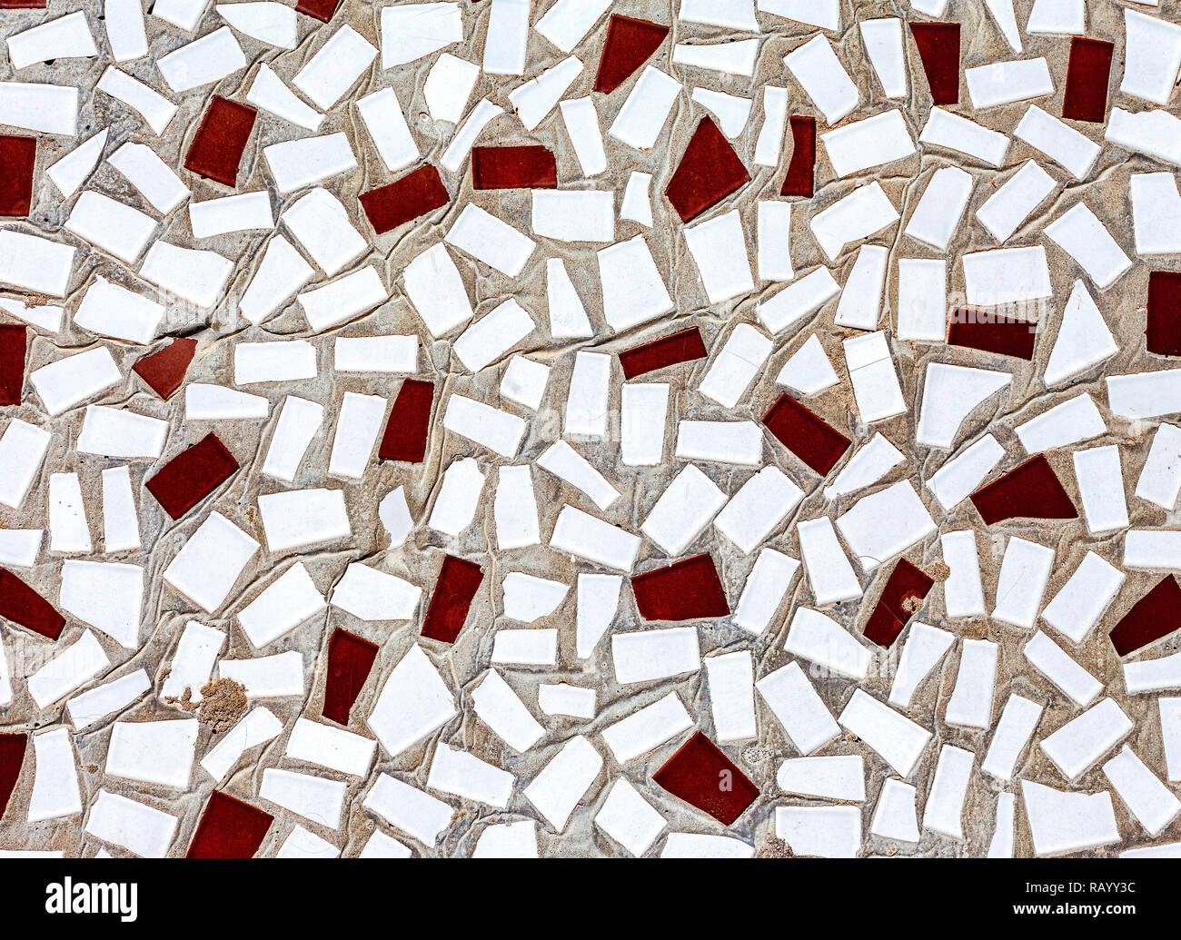 Abstract mosaic texture of broken ceramic tiles as a creative