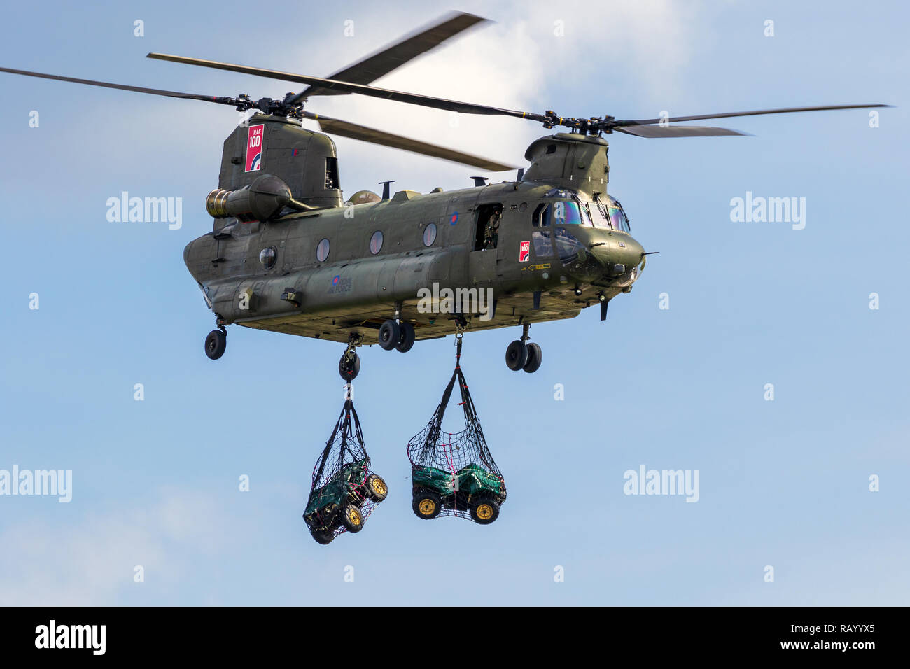 BERLIN - APR 27, 2018: British Royal Air Force Boeing CH-47 Chinook transport helicopter slingload demonstration at the Berlin ILA Air Show. Stock Photo
