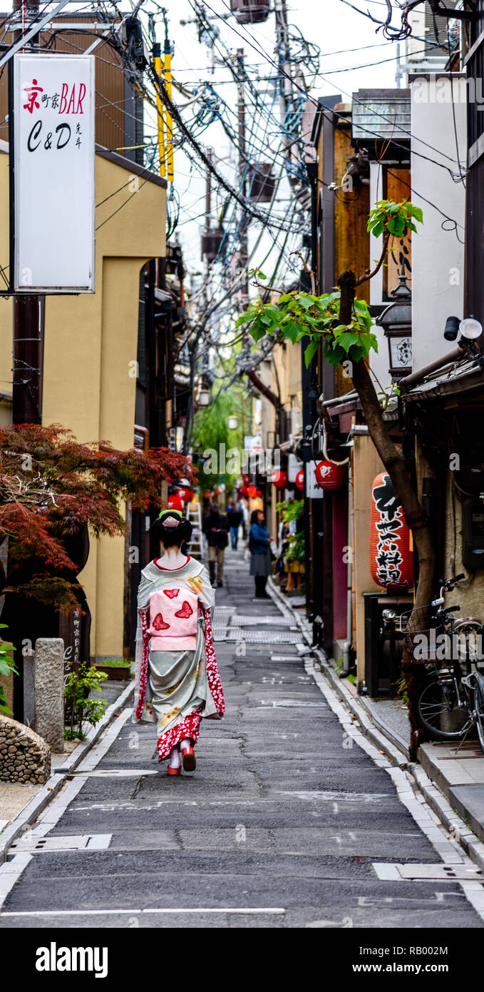 A Geisha Walking in Kyoto, Japan Stock Photo