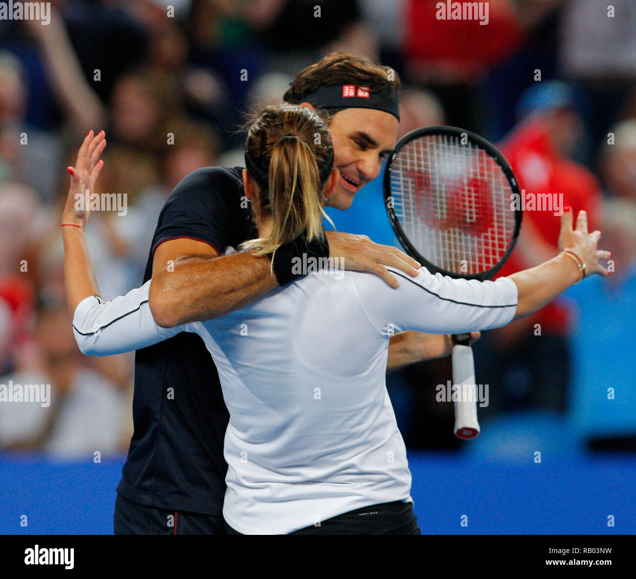 RAC Arena, Perth, Australia. 5th Jan, 2019. Hopman Cup Tennis, sponsored by  Mastercard; Belinda Bencic and Roger Federer of Team Switzerland celebrate  winning the Hopman Cup beating Germany 2 sets to 1