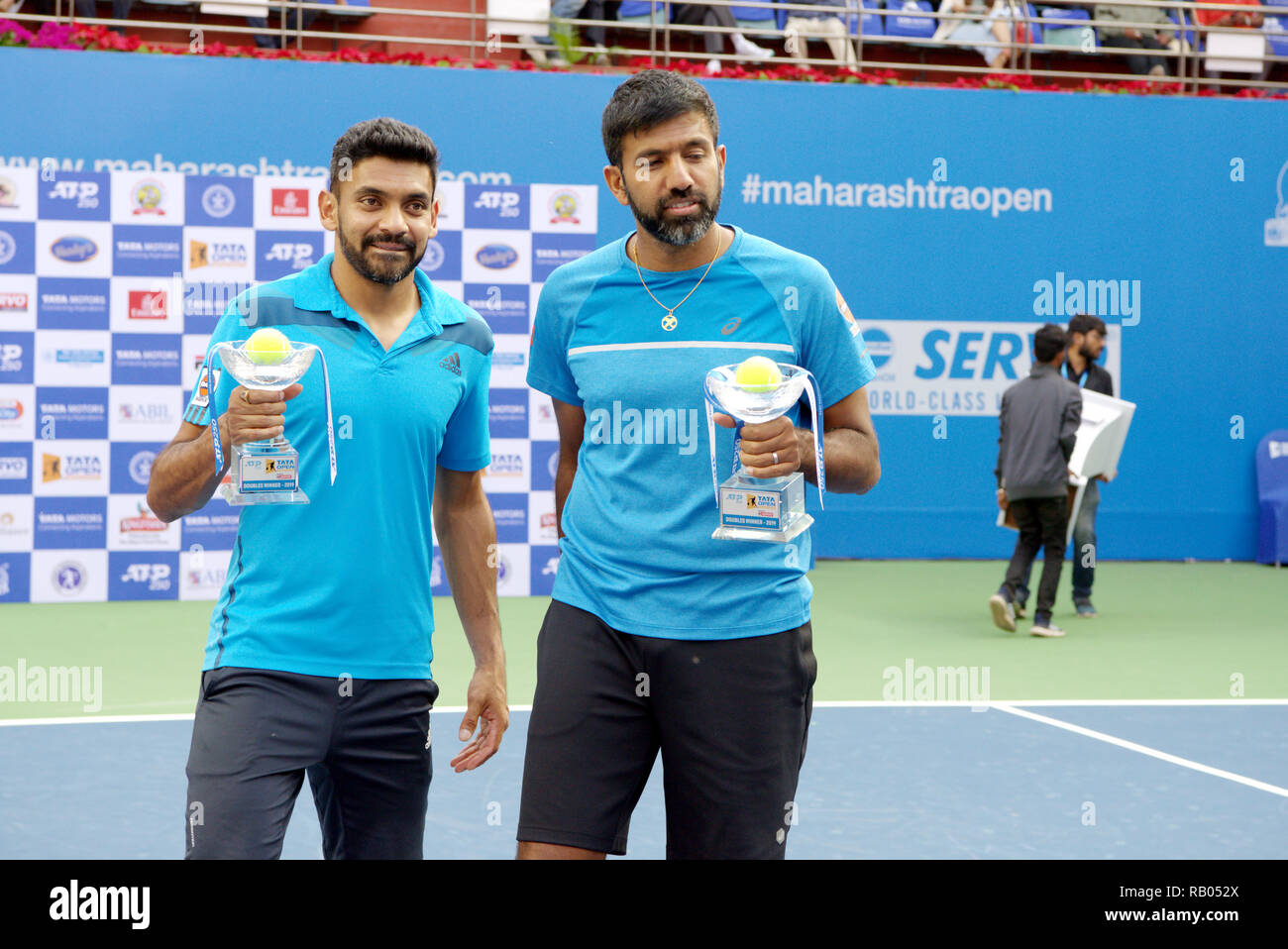 Pune, India. 5th January 2019. Divij Sharan and Rohan Bopanna, both of  India, pose with their doubles championship trophies won at Tata Open  Maharashtra ATP Tennis tournament in Pune, India. Credit: Karunesh