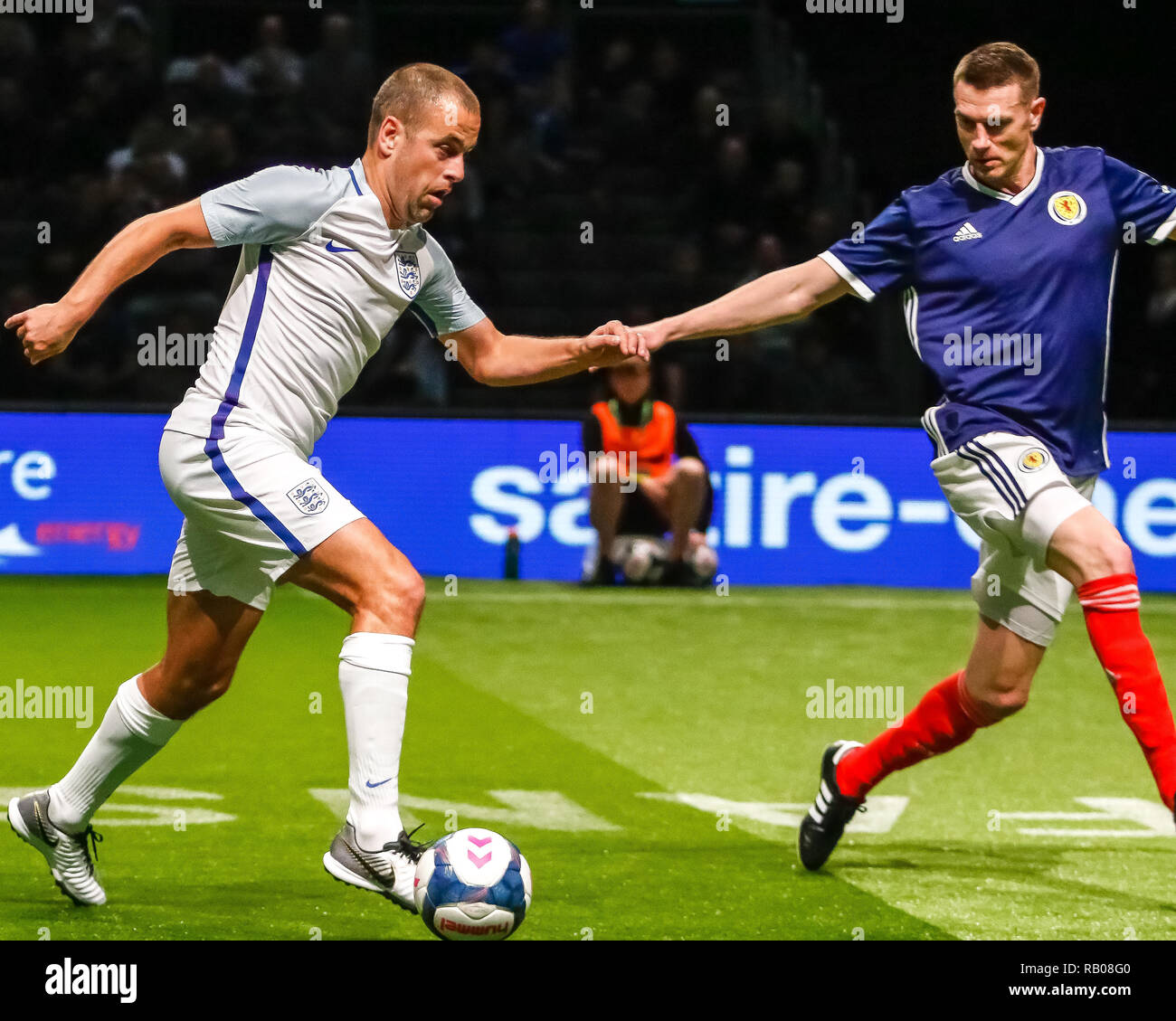 Glasgow, UK. 5th Jan 2019. Action from Day 2 of the FansBet Star Sixes Tournament at the SSE Hydro in Glasgow.   Game 6 - England Vs Scotland Joe Cole in possession during the Star Sixes Tournament in Glasgow Credit: Colin Poultney/Alamy Live News Stock Photo