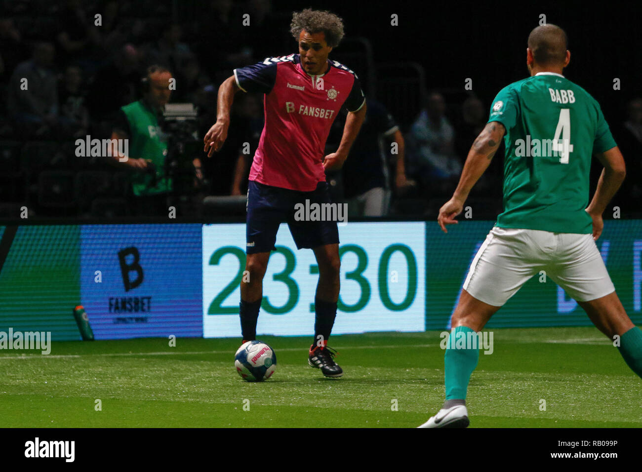 Glasgow, UK. 5th Jan 2019. Action from Day 2 of the FansBet Star Sixes Tournament at the SSE Hydro in Glasgow.   Game 1 - Rest Of the World Vs Republic Of Ireland Pierre Van Hooijdonk showing he still has it during the Star Sixes Tournament in Glasgow Credit: Colin Poultney/Alamy Live News Stock Photo