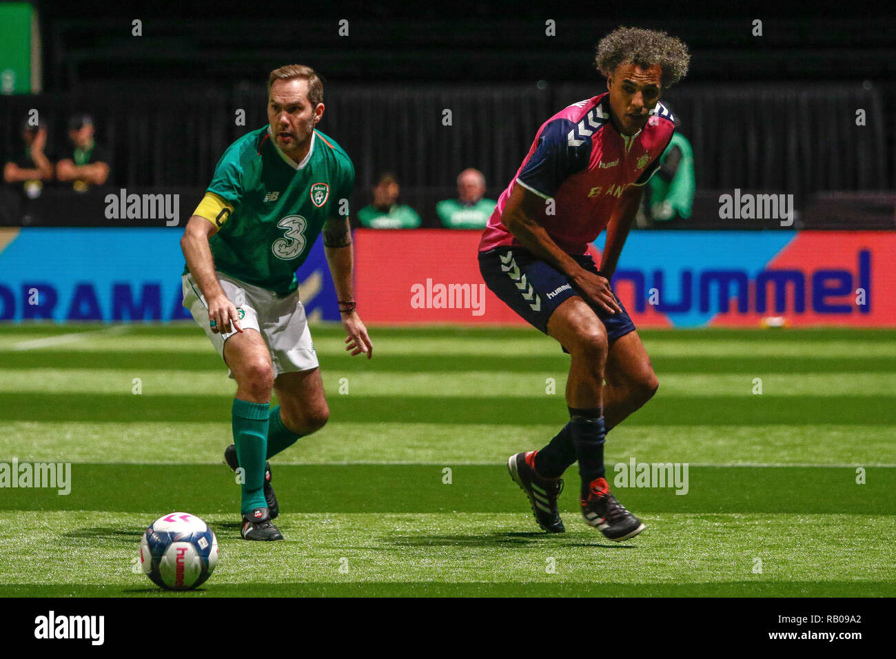 Glasgow, UK. 5th Jan 2019. Action from Day 2 of the FansBet Star Sixes Tournament at the SSE Hydro in Glasgow.   Game 1 - Rest Of the World Vs Republic Of Ireland Pierre Van Hooijdonk & Jason McAteer (C) during the Star Sixes Tournament in Glasgow Credit: Colin Poultney/Alamy Live News Stock Photo