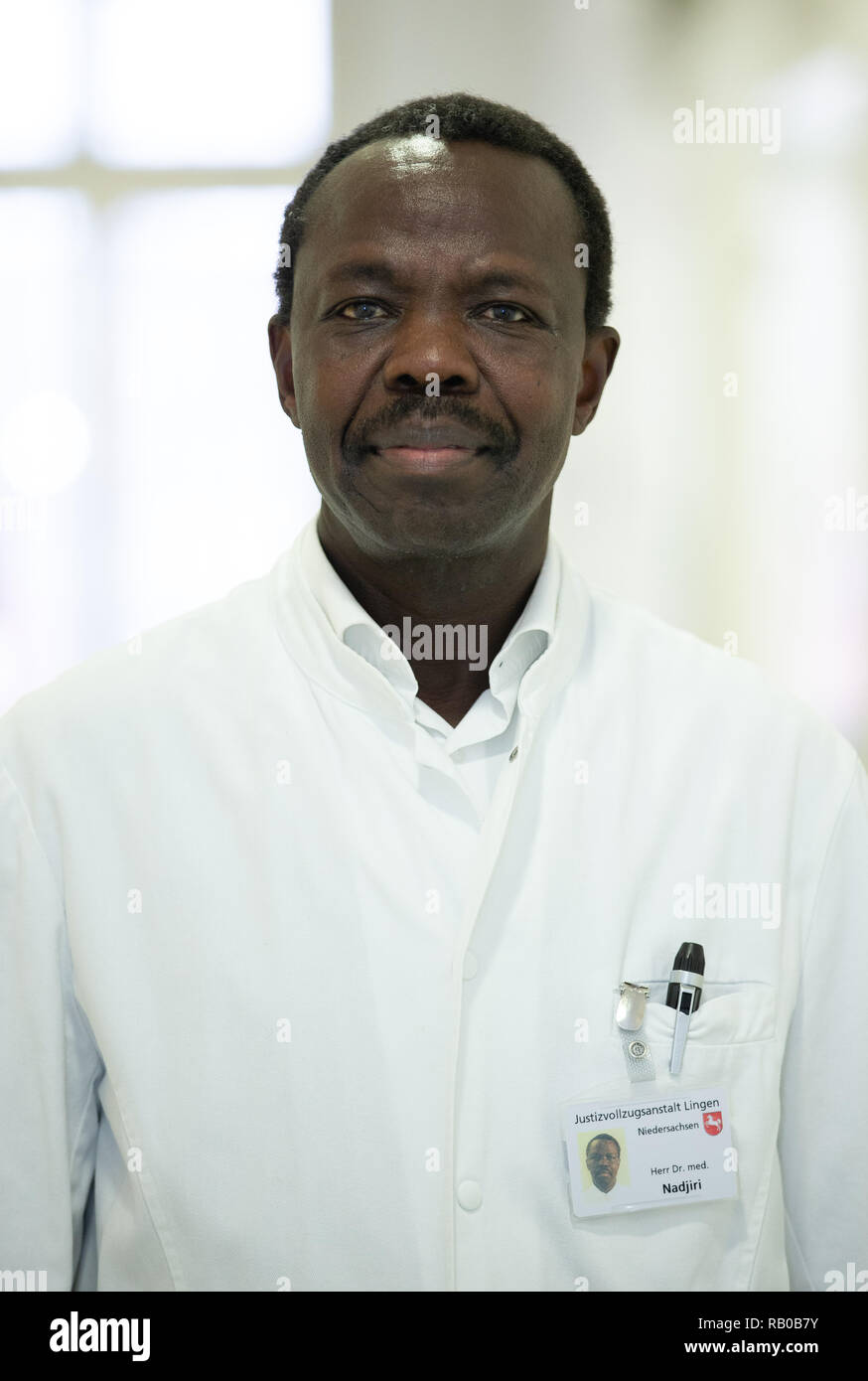 Lingen, Germany. 14th Dec, 2018. Salomon Nadjiri, senior prison doctor at the prison hospital (JVK) Lingen, stands in a corridor of the JVK. The only judicial hospital for the federal states of Lower Saxony and Bremen in Lingen feels the lack of doctors. Credit: Friso Gentsch/dpa/Alamy Live News Stock Photo