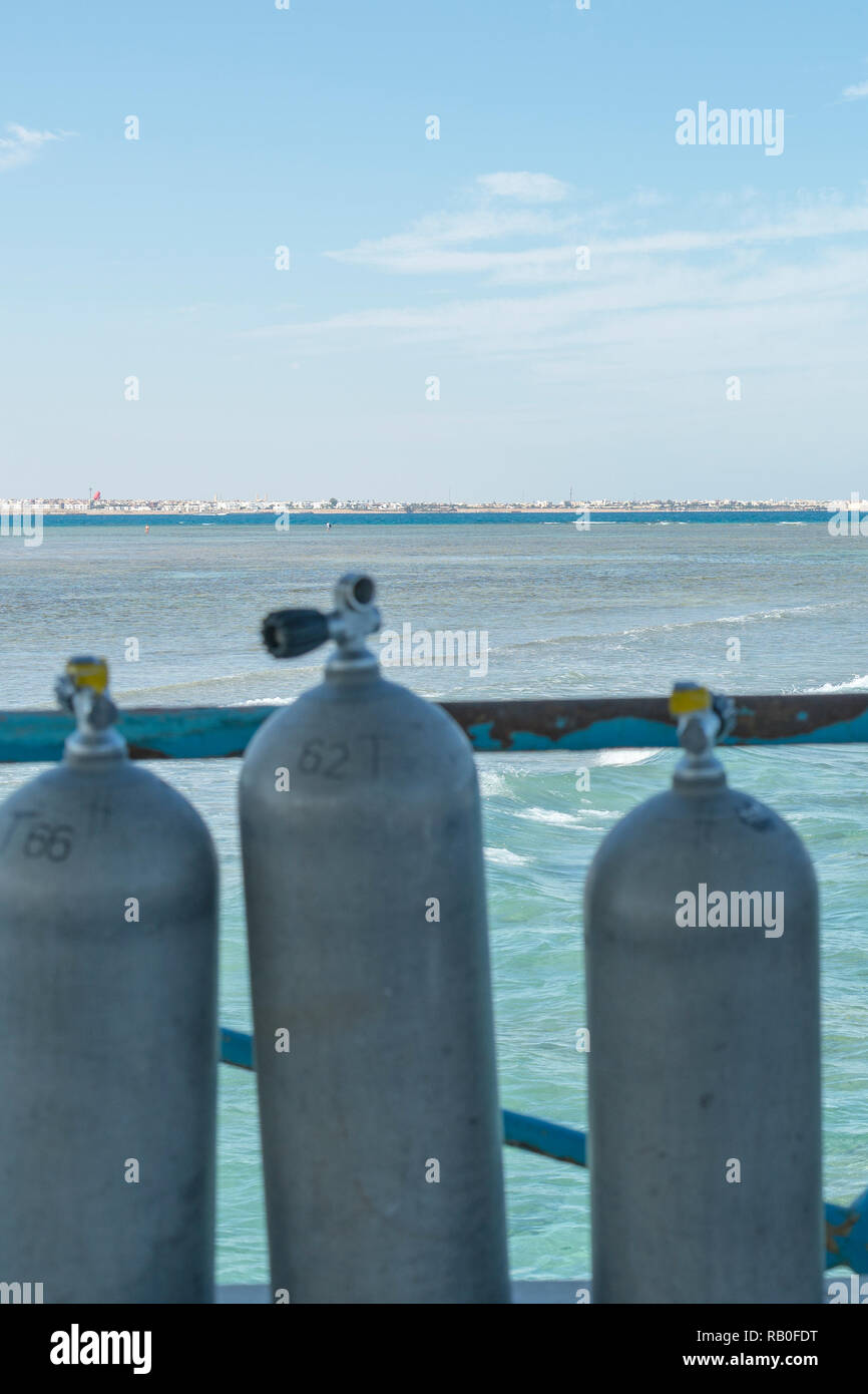 A lot of diving cylinders. oxygen cylinders outdoor. Oxygen cylinders
