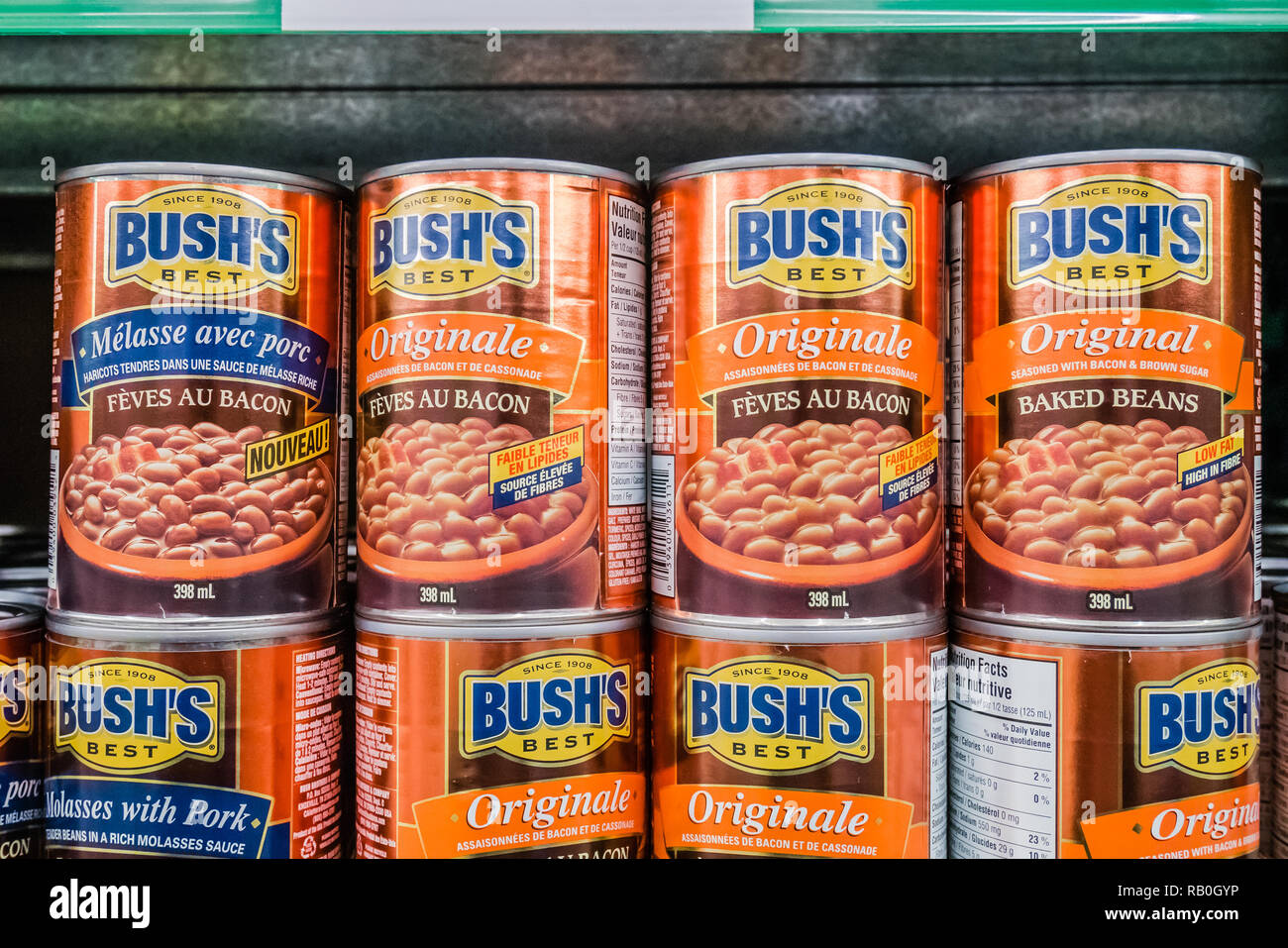 canned beans on grocery store shelve Stock Photo Alamy