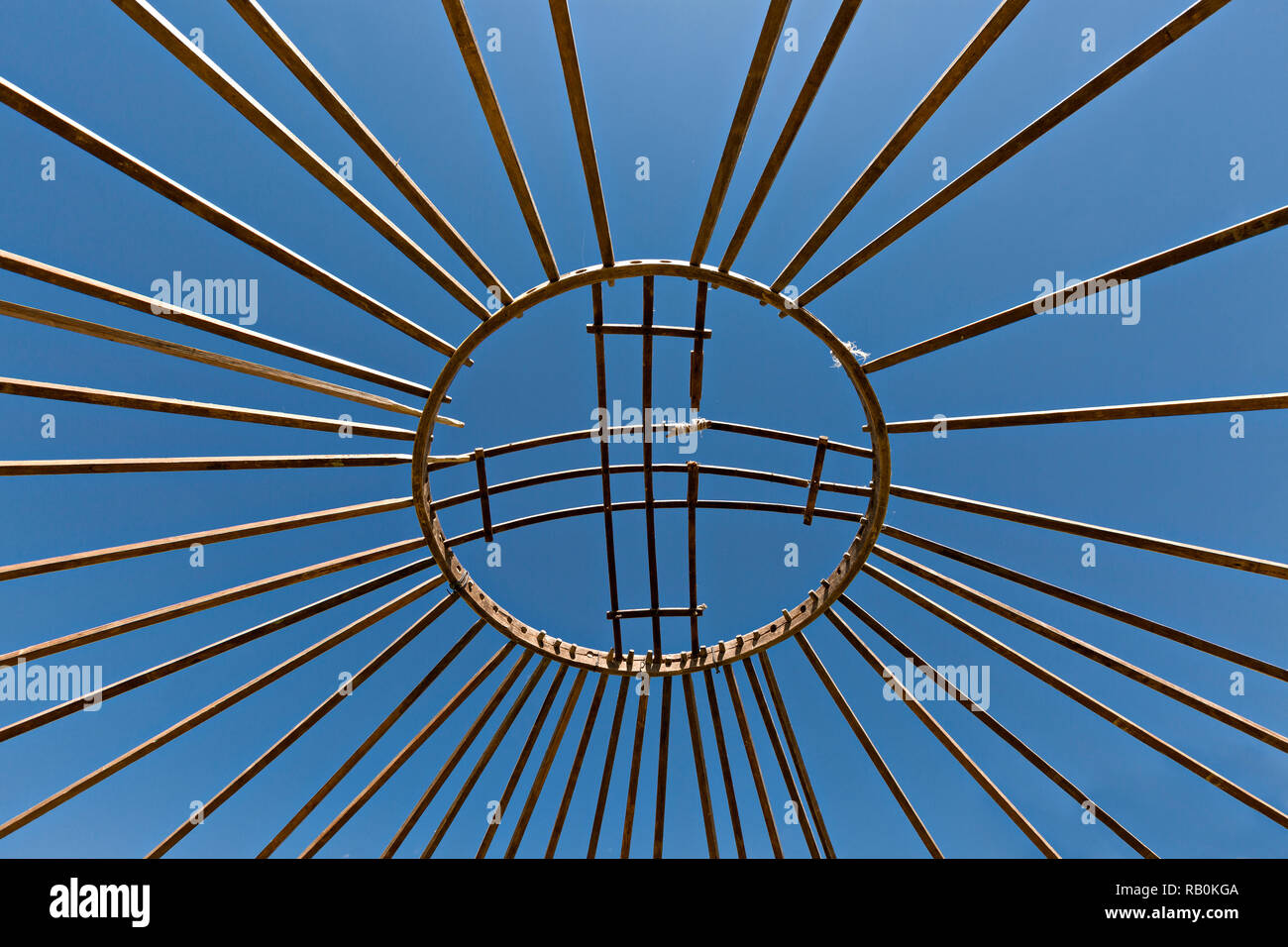 Top of the wooden sticks of a nomadic tent under construction, known as yurt, in Kazakhstan. Stock Photo