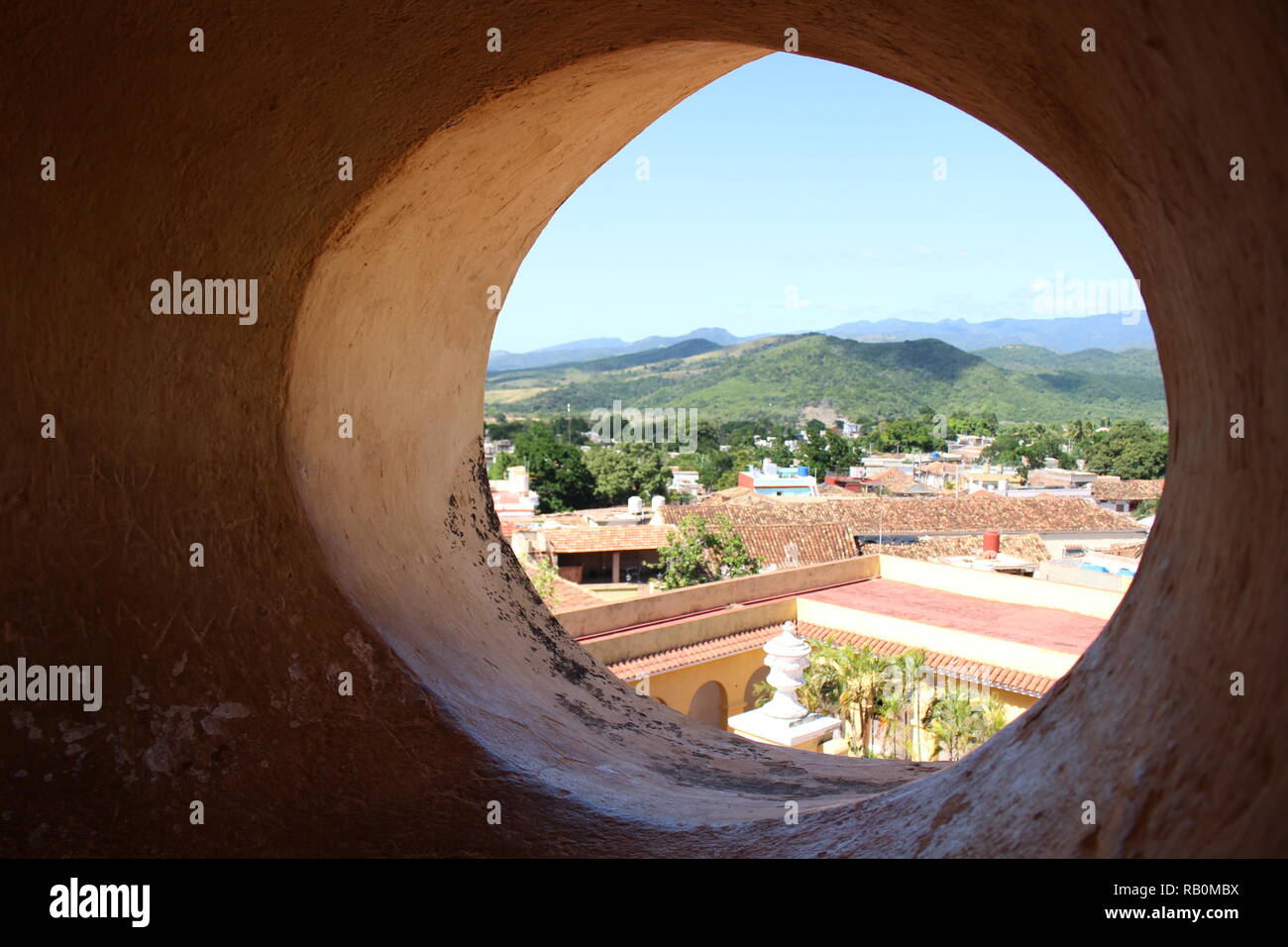 Town of Trinidad through a circular window Stock Photo
