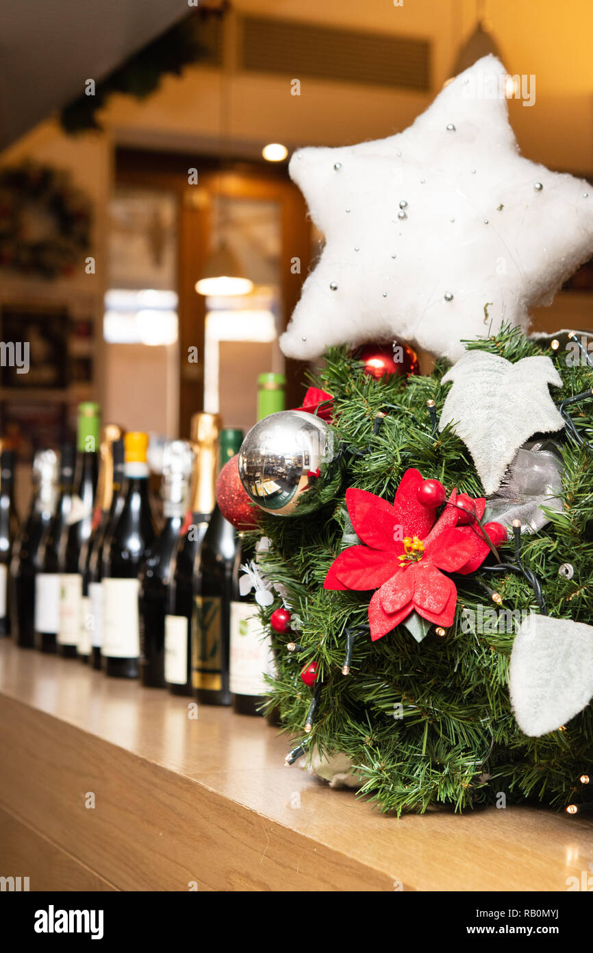Close Up On Christmas Winter Decoration In Wine Shop Large Group